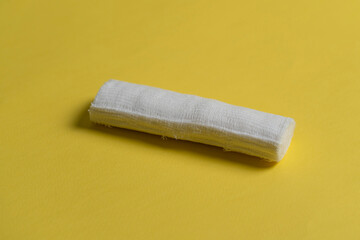 a first aid and wound injury protection concept, a white medical bandage tape isolated