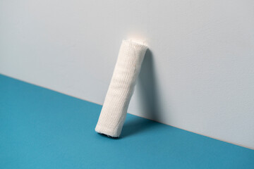 a first aid and wound injury protection concept, a white medical bandage tape isolated