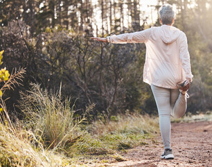 Fitness, balance or old woman in nature to start training, running exercise or hiking workout in...