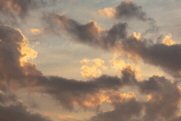 Colorful clouds at sunset as background.