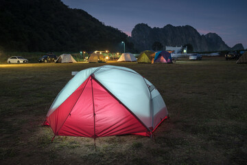 Tourist tent at night. evening sky