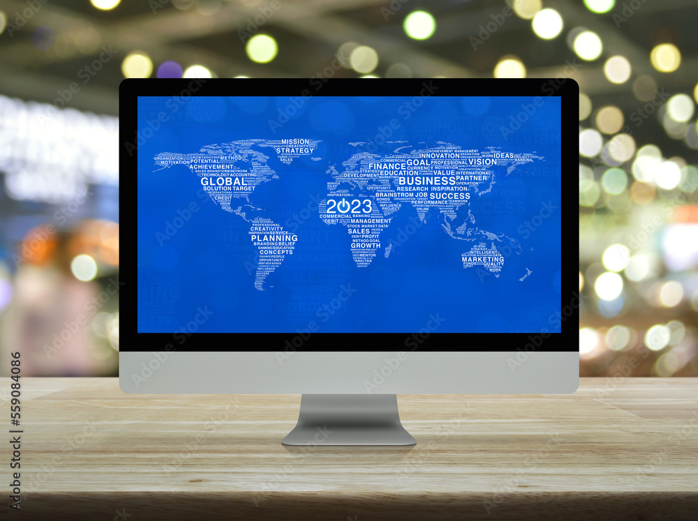 Poster start up business icon with global words world map on computer screen on table over blur shopping ma