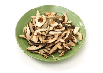 Dried bitter orange used in chinese herbal medicine isolated over white background. Zhi Ke, Fructus citri Aurantii. White background