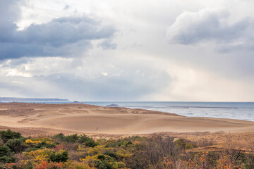 The autumn view of Tottori Sand Dunes, located outside the city center of Tottori in Tottori Prefecture, Japan. The backgroud is Sea of Japan.