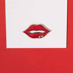 kiss of red lips on white paper