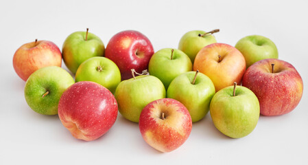 Apples on white background. Fruits and vitamins. Healthy eating. Veganism, diet