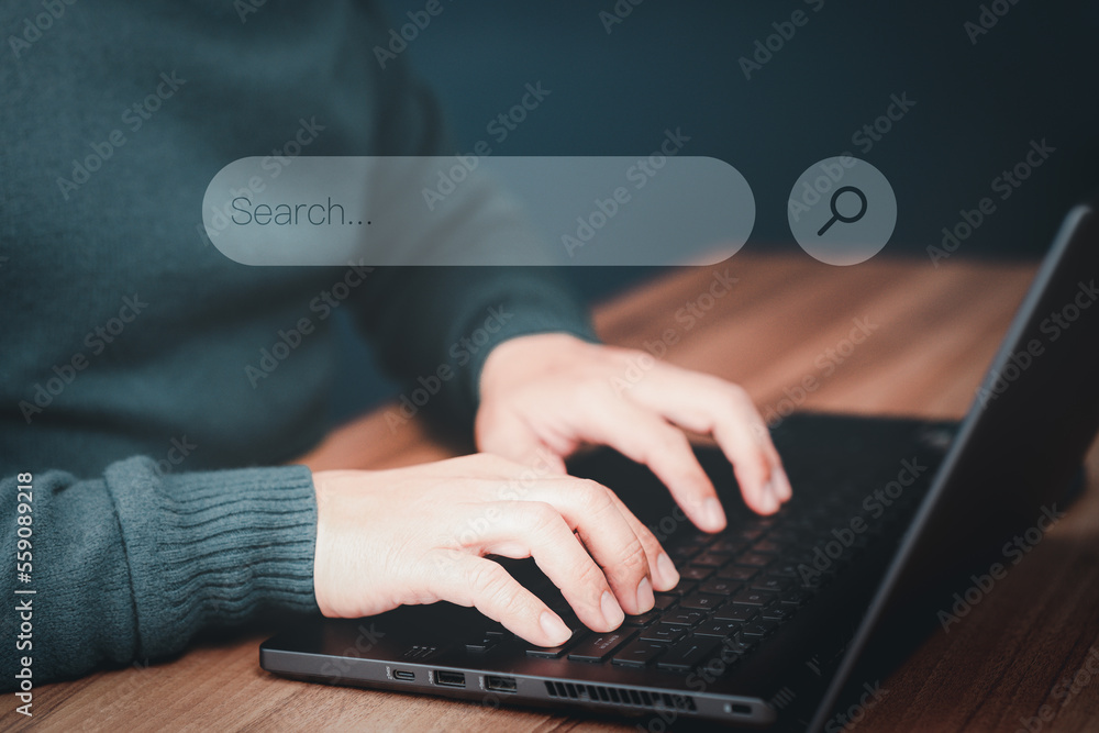 Poster Businessman's hand working with computer laptop on desk in home. Searching Browsing Internet Data Information with blank search bar. Search Engine Optimization SEO Networking Concept.