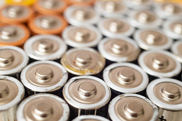 Obraz premium many batteries stacked, soft focus macro