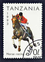 Cancelled postage stamp printed by Tanzania, that shows Horse Racing, circa 1993.