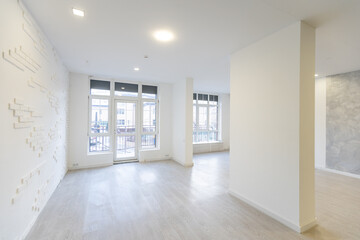 Empty office, big white board on the white wall