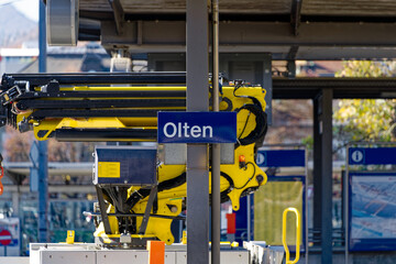 Blue and white sign at Swiss railway station Olten on a sunny autumn day. Photo taken November 10th, 2022, Olten, Switzerland.