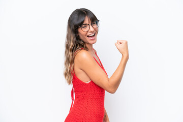 Young caucasian woman isolated on white background celebrating a victory