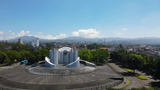Aerial view of Monument to the Struggle (Monumen Perjuangan), Landmark of Bandung, monument with Garuda, Indonesia national emblem and motto, Unity in Diversity (Bhineka Tunggal Ika)