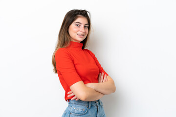 Young caucasian woman isolated on white background with arms crossed and looking forward