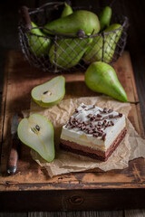 Sweet pear cake made of fresh fruits on wooden box