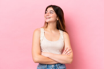 Young caucasian woman isolated on pink background happy and smiling