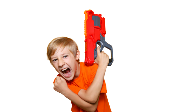 a boy on a transparent background in an orange T-shirt screams holding a toy gun in his hands