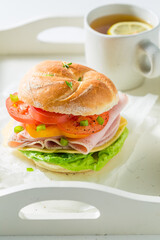 Crisp and delicious sandwich made of ham, cheese and tomatoes.