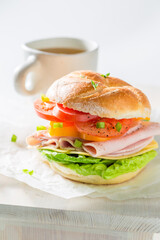 Crisp and delicious sandwich made of cheese, tomatoes and ham.