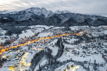 Winter landscape of Zakopane town and Tatra Mountains, drone view - obrazy, fototapety, plakaty