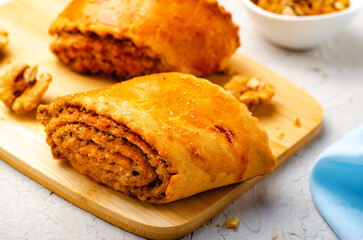 Armenian dessert Gata on a gray background and wooden board, Delicious Shortbread Cookie
