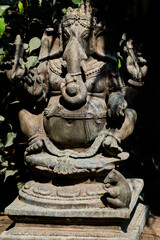 Fototapeta premium Statue of the indian god Ganesha in yoga like pose