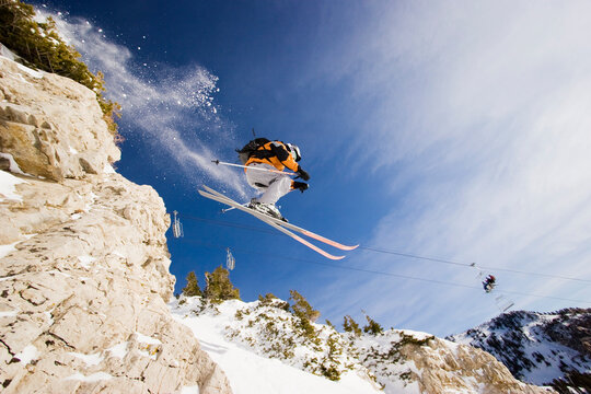 Greg Liscot skiing off a cliff at Snowbird, Utah