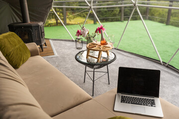 laptop in the dome camping