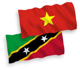 Flags of Federation of Saint Christopher and Nevis and Vietnam on a white background