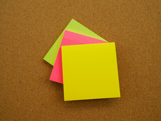 Colorful not pad on wood board