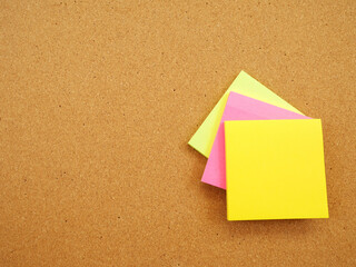 Colorful not pad on wood board with copy space