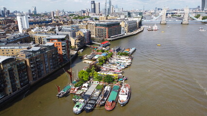 Fototapeta na wymiar House boats moored on river Thames London drone aerial view .