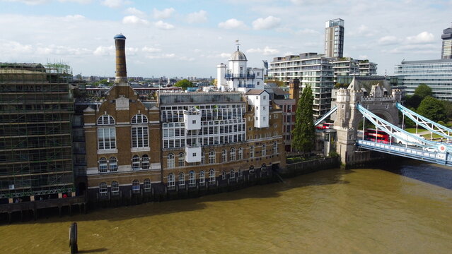 Old Warehouse Converted Into Appartments Overlooking Tower Bridge In London UK Drone Aerial View