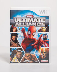 Obraz premium Kent, england 01.01.2023 Nintendo wii marvel ultimate alliance game on a white isolated background. iconic retro vintage video gaming machine. Japanese technology family gaming fun.