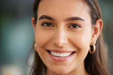 Portrait, beauty and skincare with a woman, happy inside with a nose ring peircing and smile on her...