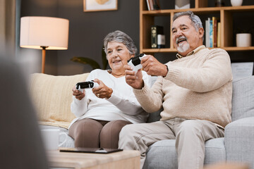 Video game, sofa and senior couple with gaming online in home for happy holiday, retirement and lifestyle together with technology. Excited, elderly and gamer people on a couch with living room games