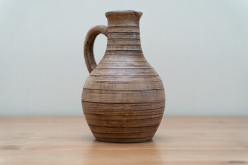 Ceramics, a ceramic product made with their own hands on a potter's wheel, a mug.