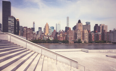 Manhattan skyline seen from the Roosevelt Island, color toning applied, New York City, USA.