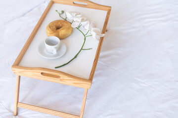 a tray with breakfast on the bed, valentines day concept
