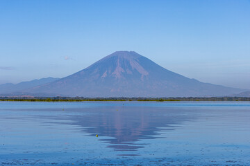 Fototapeta premium Chaparrastique volcano seen from Laguna Olomega in San Miguel, El Salvador