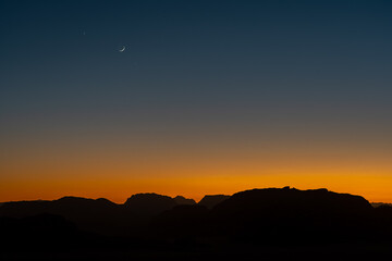Sunset over the mountains in the Wadi Rum desert in Jordan
