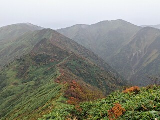 Mt. Shirasuna with autumn leaves in September. Sakae Village, Nagano Prefecture, Japan