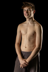 Fototapeta premium A shirtless 17 year old muscular boy