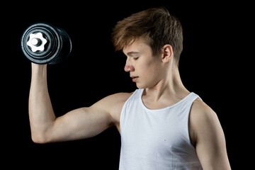 A 17 Year old  wearing a white tank top