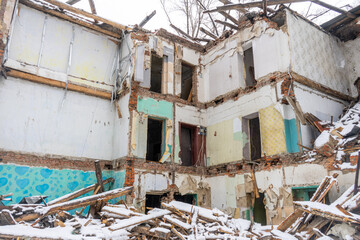 An old ruined building in a snowfall