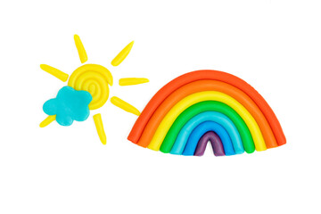 Obraz premium Plasticine rainbow, cloud, sun with rays isolated on white background. Plasticine creativity, children's hobby concept