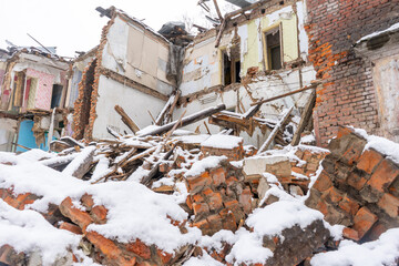 An old ruined building in a snowfall