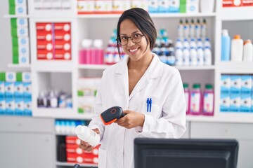 Young hispanic woman  at pharmacy