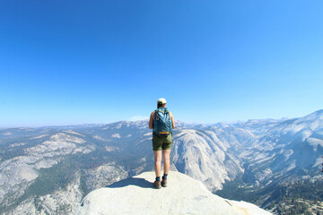 hiker on top of mountain