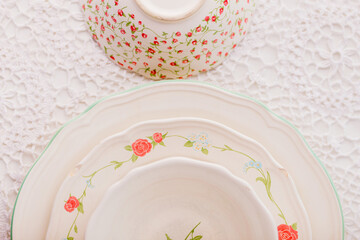 Closeup of porcelain plates and bowls